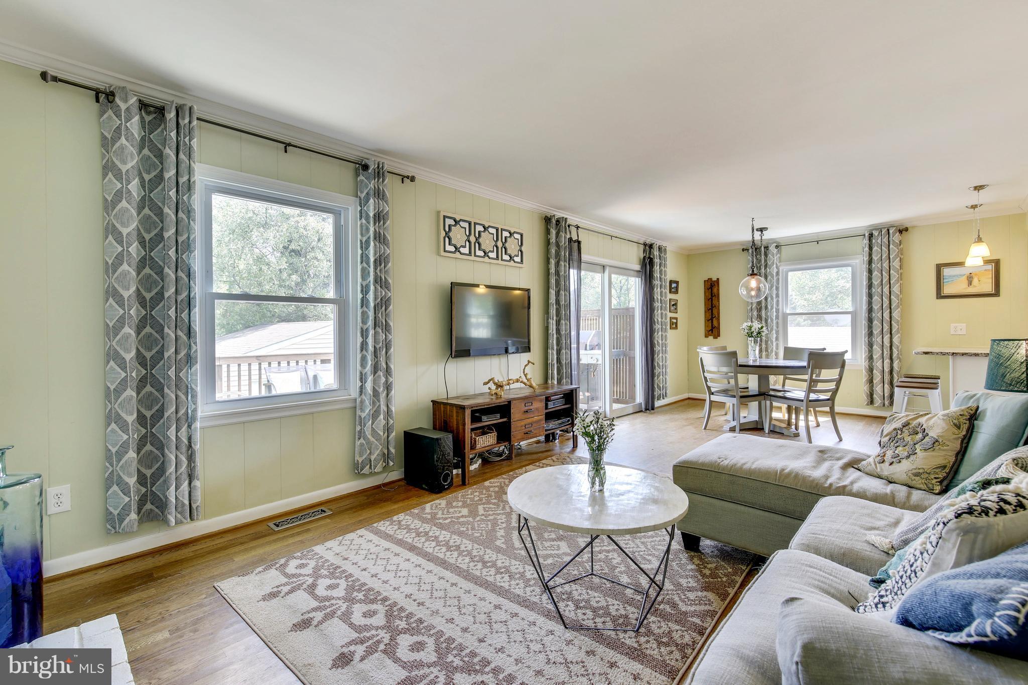4418 Bennion Road Silver Spring, MD 20906 - Photo 10 of 23 a living room with furniture and a window