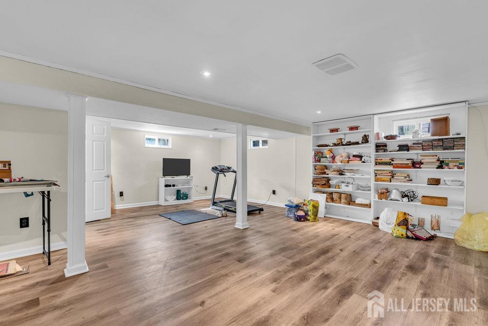 10 Kings Road East Brunswick, NJ 08816 - Photo 16 of 33 a view of a livingroom with storage & utility