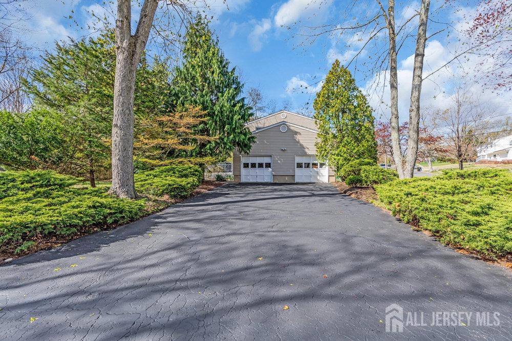 10 Kings Road East Brunswick, NJ 08816 - Photo 31 of 33 a view of a garden with pathway