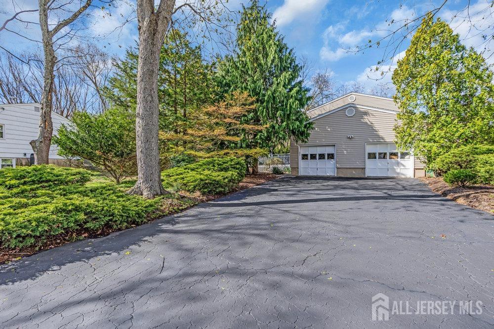 10 Kings Road East Brunswick, NJ 08816 - Photo 33 of 33 a view of a house with a yard and plant