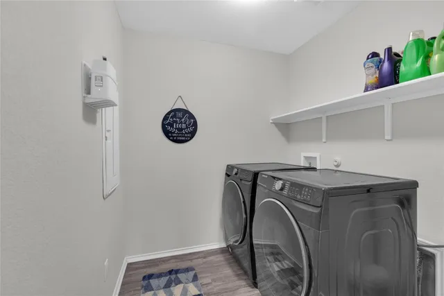 a utility room with dryer and washer