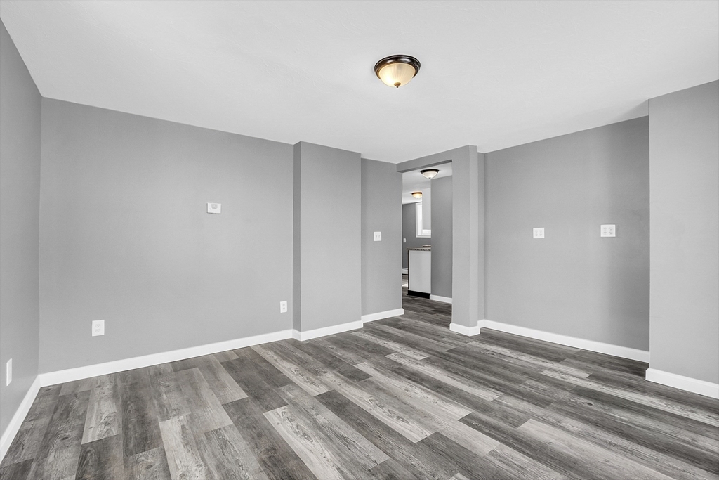 73 Ash Street Gardner, MA 01440 - Photo 33 of 40 a view of a livingroom with wooden floor