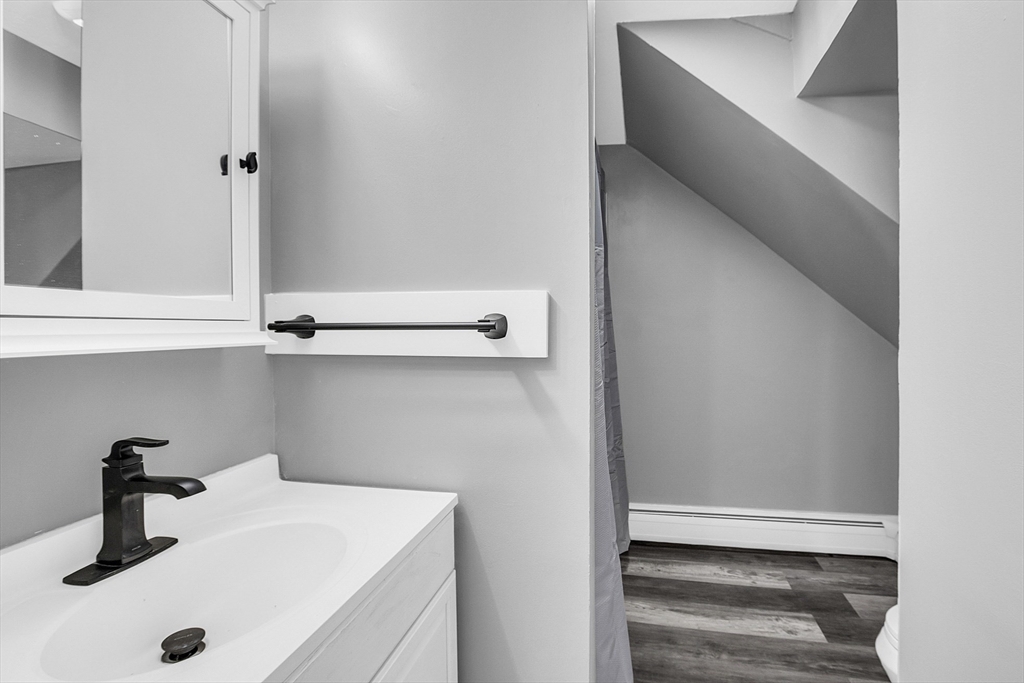 73 Ash Street Gardner, MA 01440 - Photo 34 of 40 a bathroom with a sink