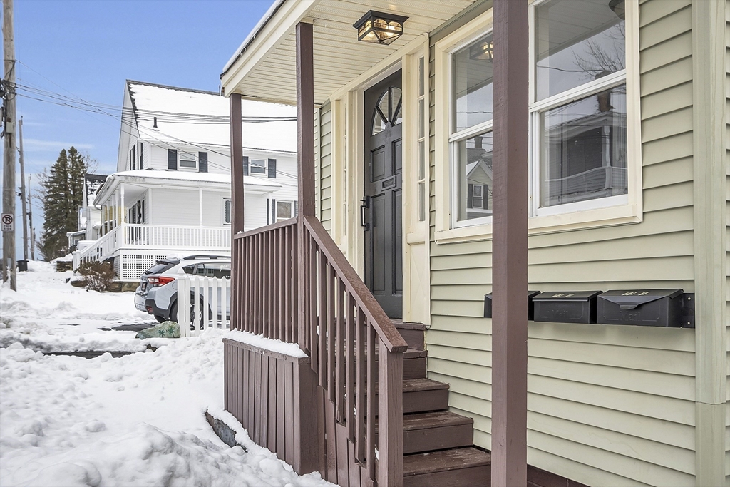 73 Ash Street Gardner, MA 01440 - Photo 36 of 40 a view of a patio with a fence