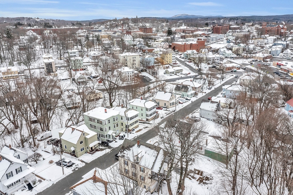 73 Ash Street Gardner, MA 01440 - Photo 40 of 40 an aerial view of residential building with parking space