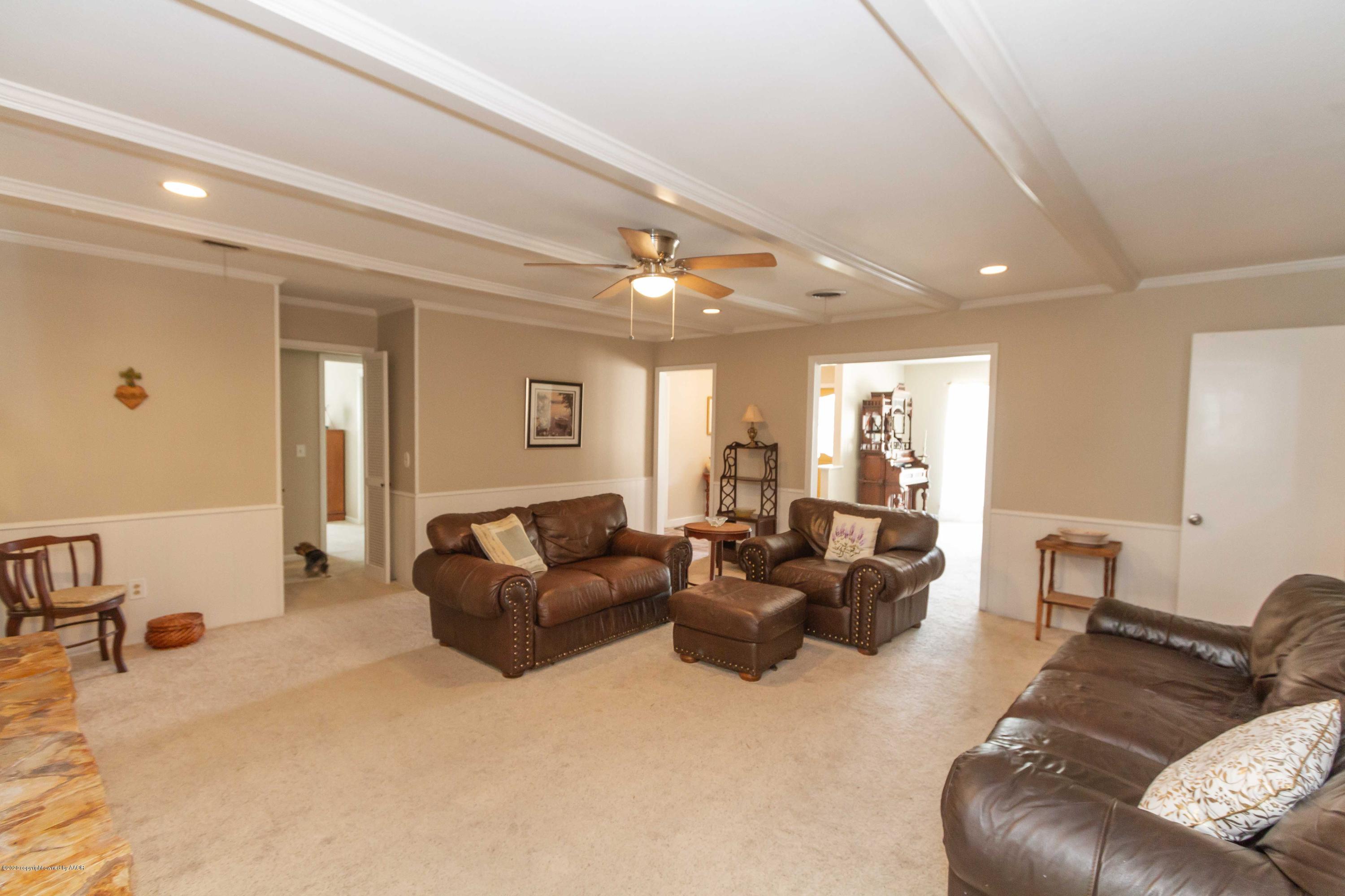 7206 Calumet Road Amarillo, TX 79106 - Photo 14 of 44 a living room with furniture and a large window