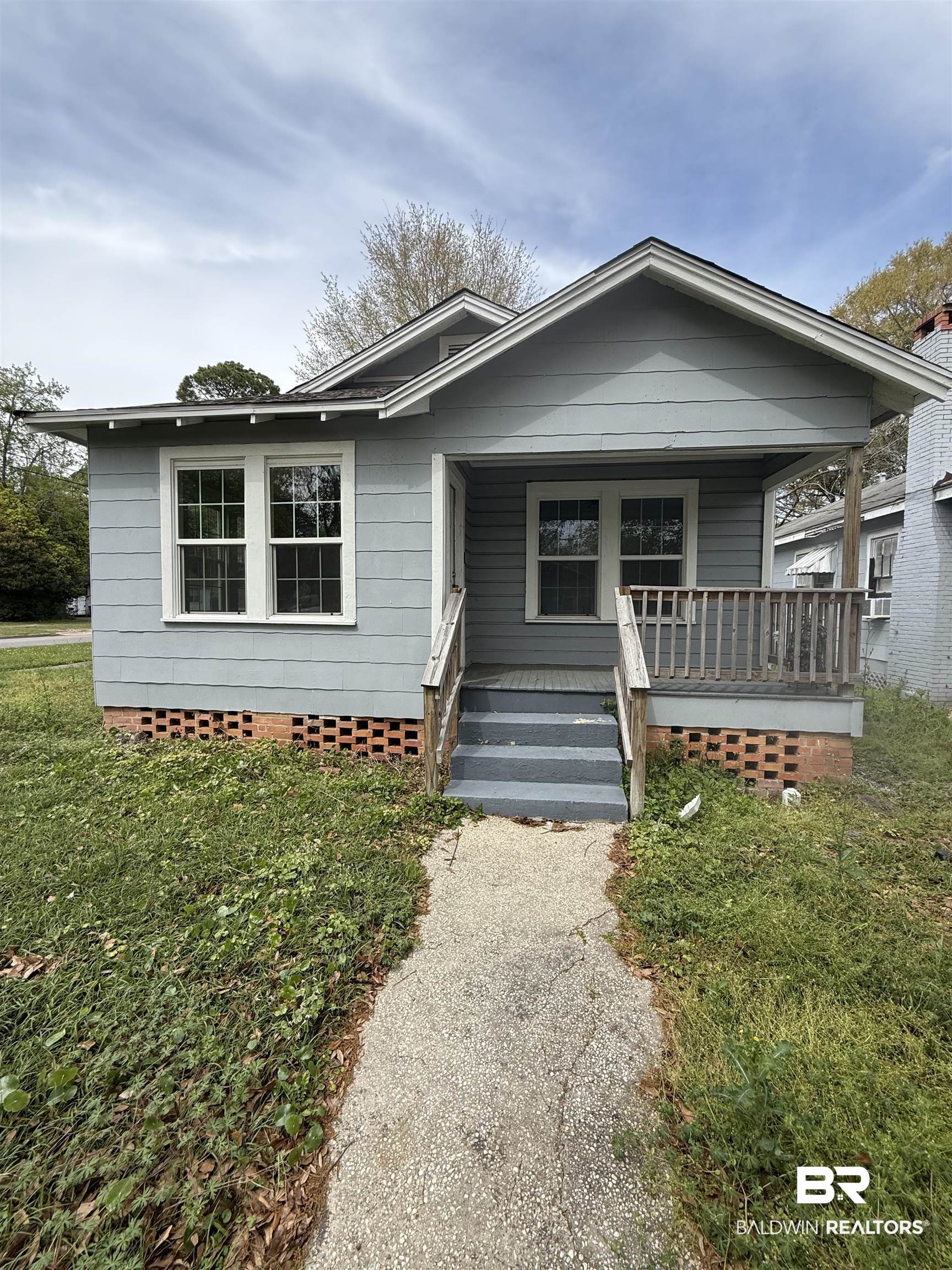 1848 Canal Street Mobile, AL 36606 - Photo 1 of 11 Bungalow featuring a porch and a front yard