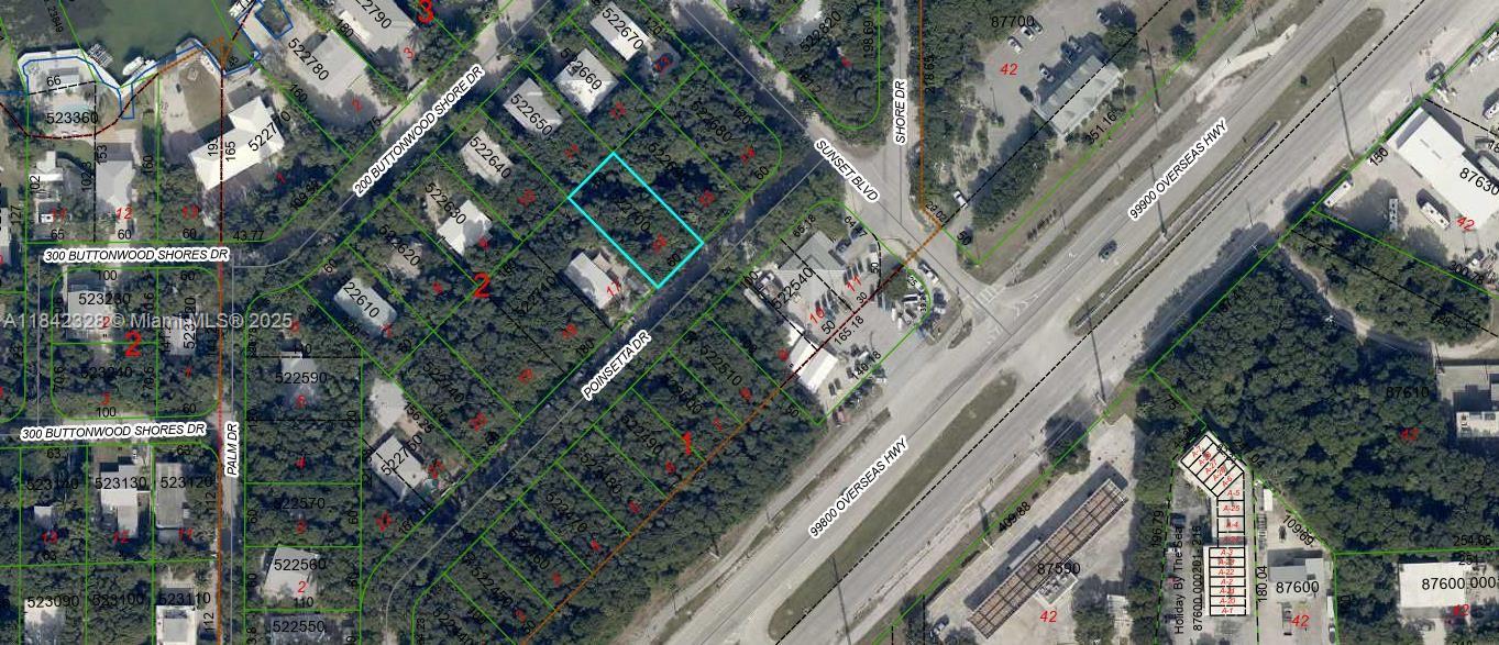 0 Poinsetta Key Largo, FL 33037 - Photo 2 of 3 a view of a city with flower in a balcony