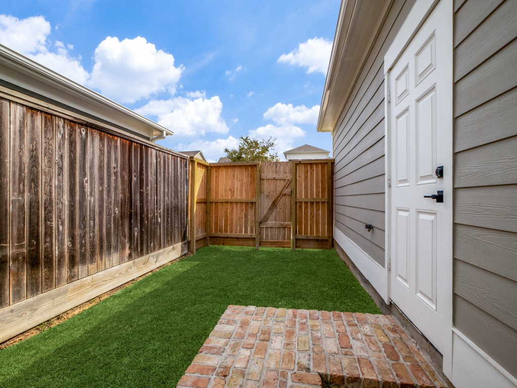 43 Red Harper Drive Spring, TX 77389 - Photo 20 of 22 Fenced backyard with private walkway from garage