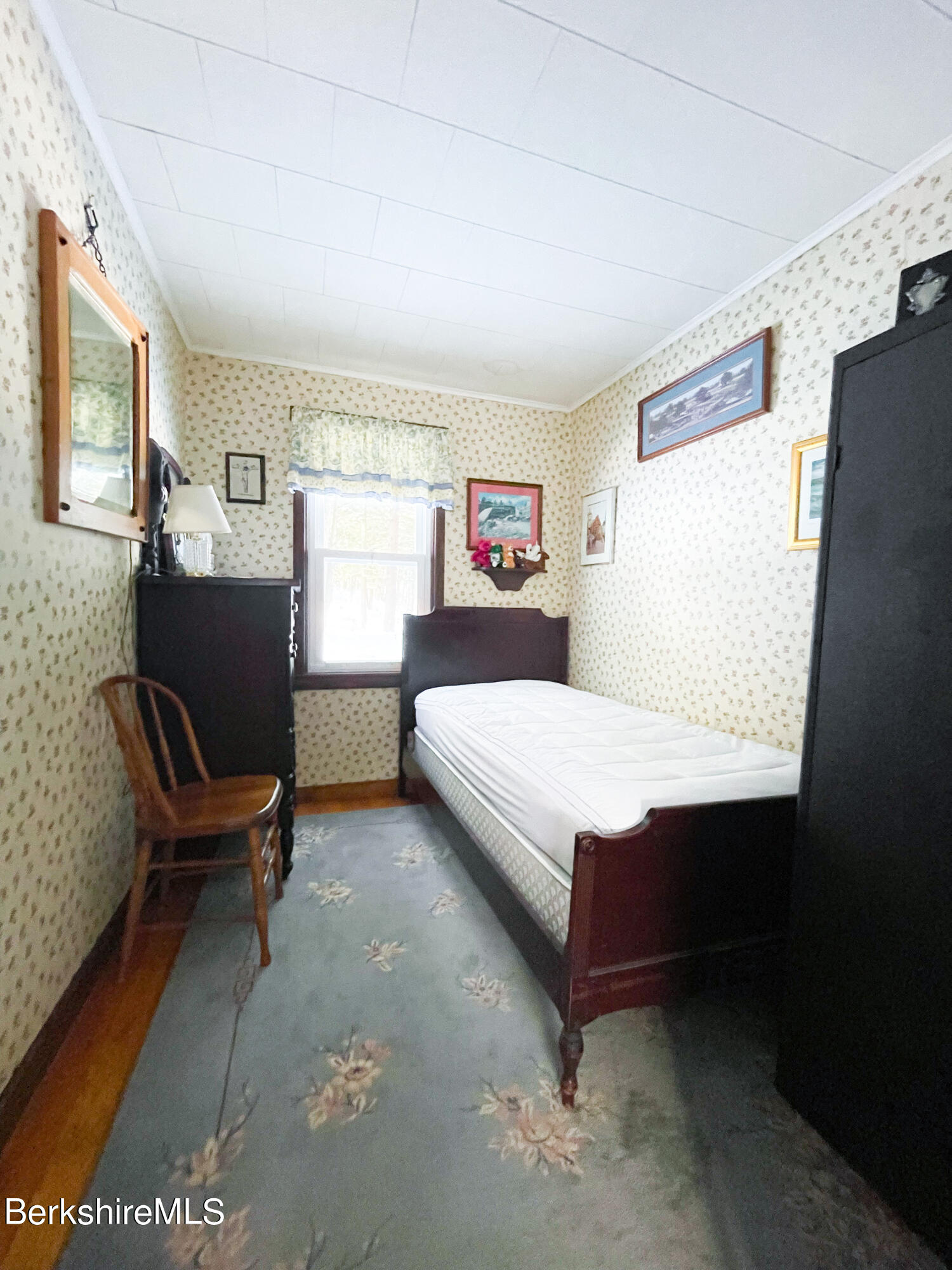 100 Highland Road Becket, MA 01223 - Photo 12 of 22 a bedroom with a bed chair and window