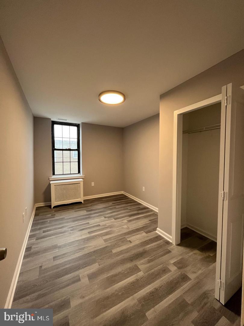 1208 Mifflin Street, Unit 2 Philadelphia, PA 19148 - Photo 7 of 14 a view of an empty room and window