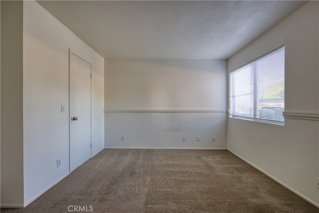 321 Inger Drive, Unit G55 Santa Maria, CA 93454 - Photo 11 of 16 an empty room with windows