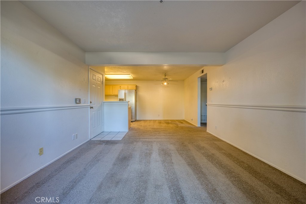321 Inger Drive, Unit G55 Santa Maria, CA 93454 - Photo 8 of 16 a view of empty room with wooden floor
