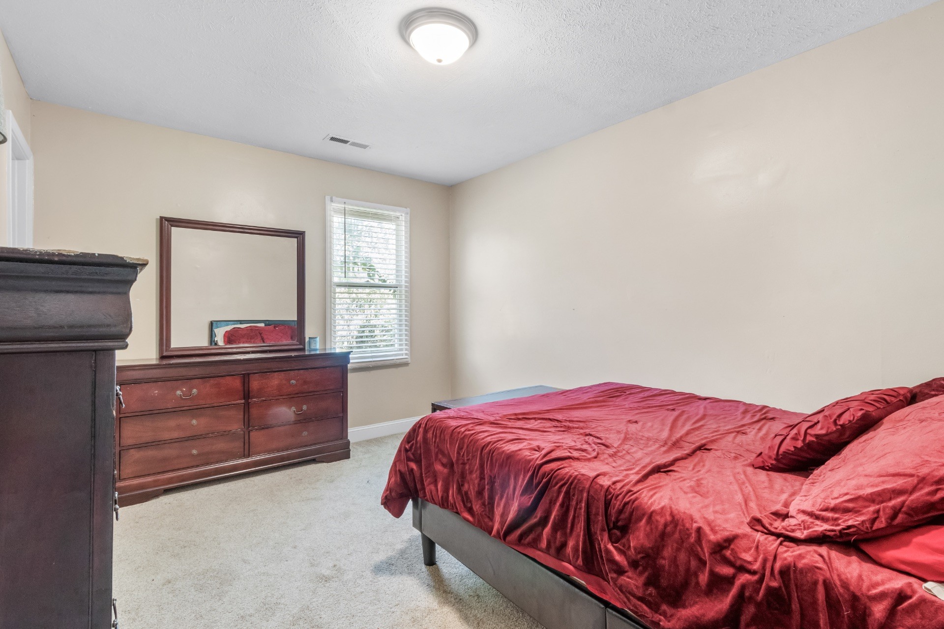 586 Foxfield Road Hopkinsville, KY 42240 - Photo 24 of 30 a bedroom with a bed and a dresser