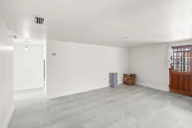 a view of livingroom with furniture and closet
