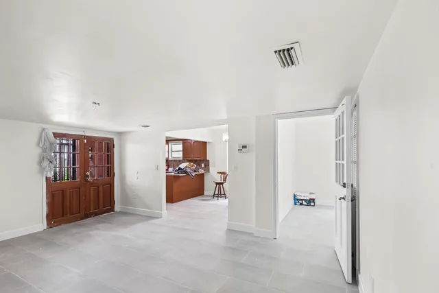 a view of an empty room with window