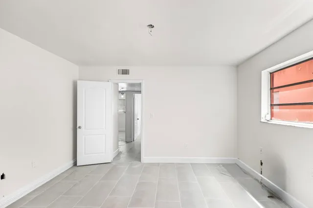 an empty room with a window