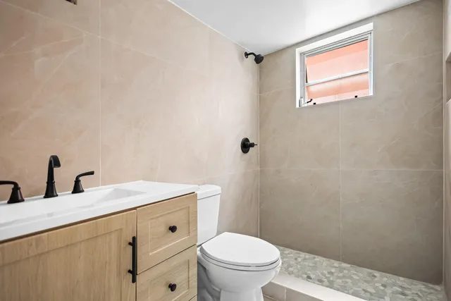 a view of walk in closet with window