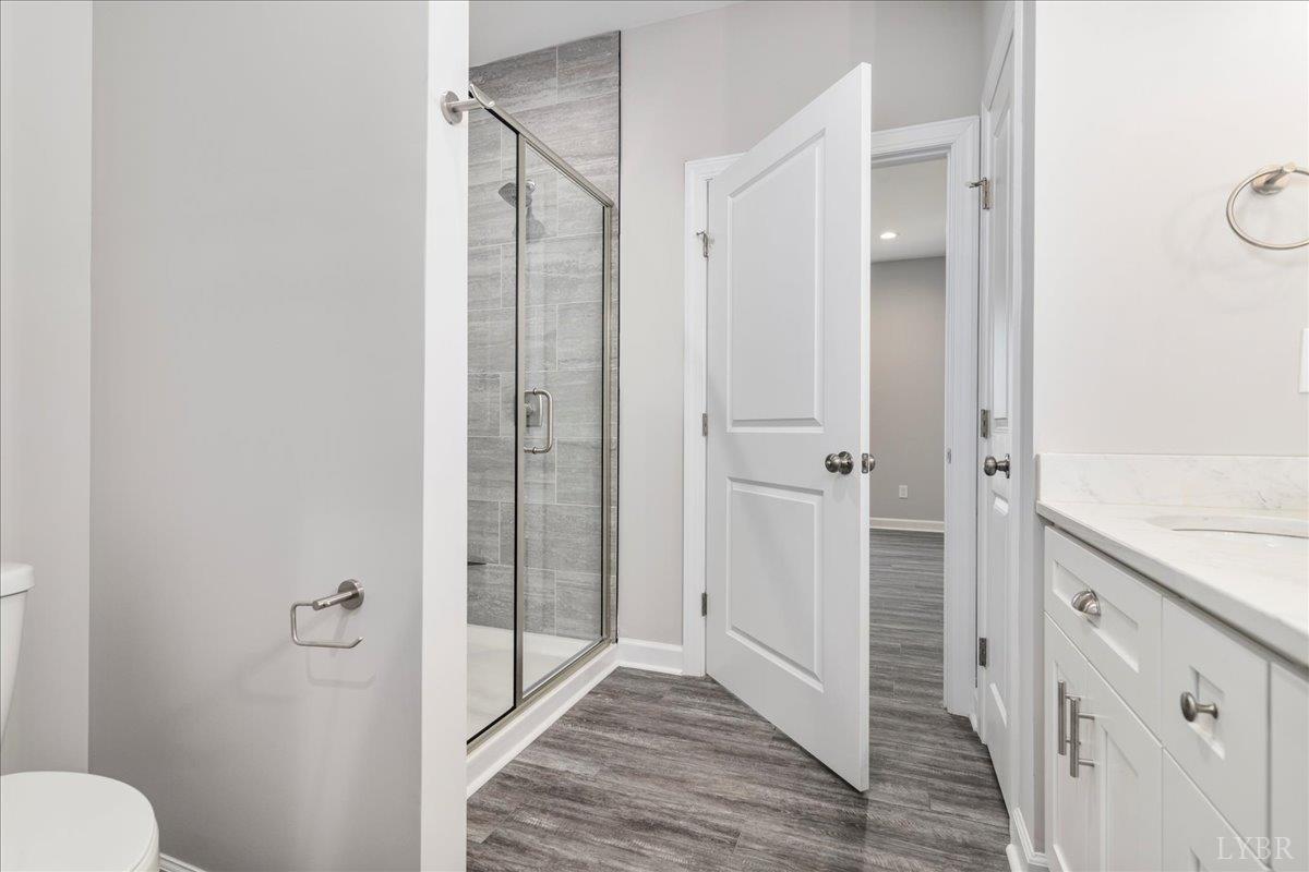 9830 Leesville Road Evington, VA 24550 - Photo 28 of 33 a bathroom with a shower and a toilet