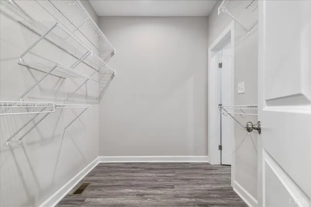 a view of a room with racks on the wall