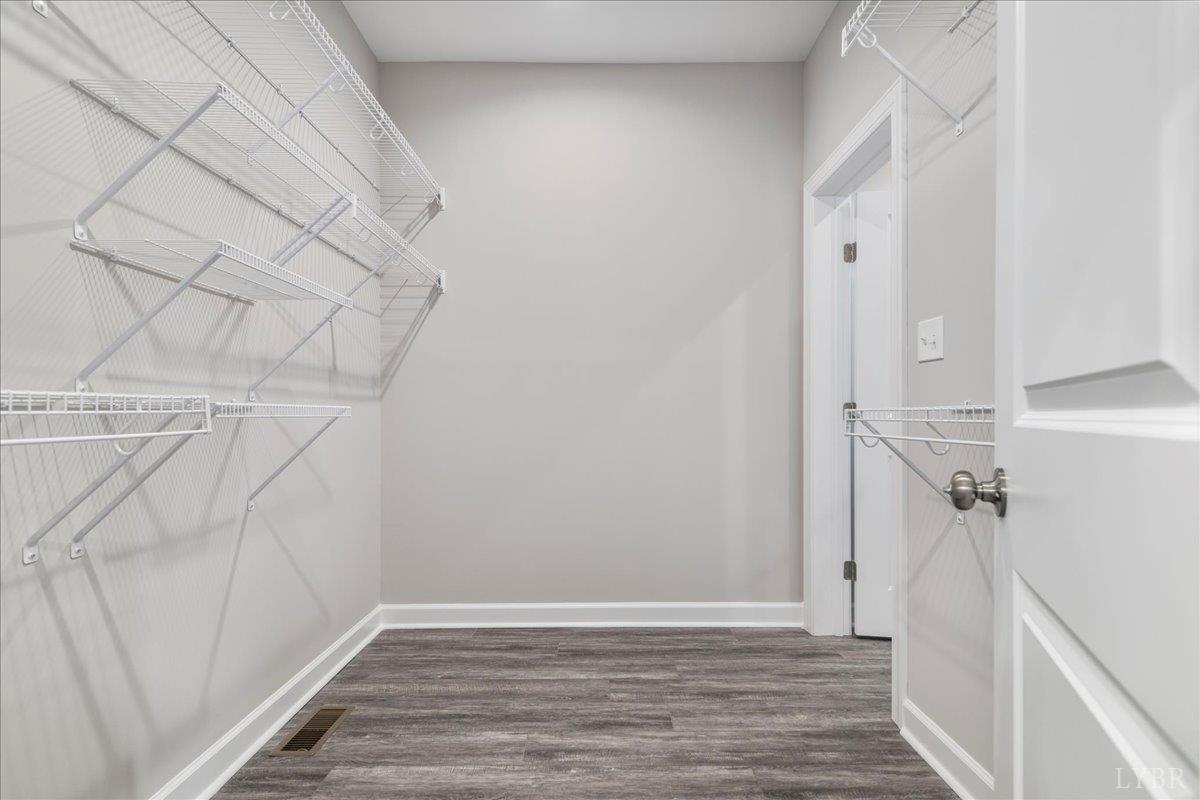 9830 Leesville Road Evington, VA 24550 - Photo 29 of 33 a view of a room with racks on the wall