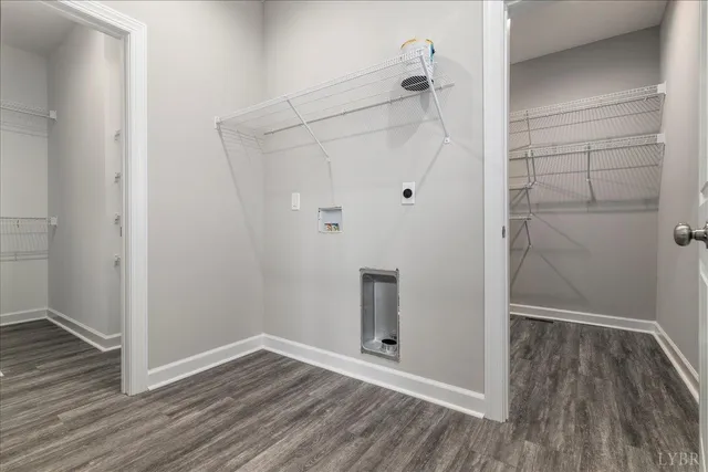 an empty room with wooden floor