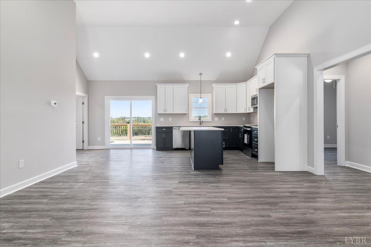 9830 Leesville Road Evington, VA 24550 - Photo 10 of 33 a large kitchen with stainless steel appliances granite countertop a stove and a refrigerator