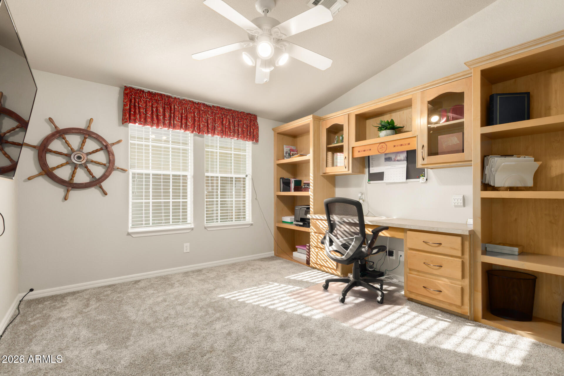 3301 South Goldfield Road, Unit 4086 Apache Junction, AZ 85119 - Photo 11 of 42 a view of a workspace with furniture and a window