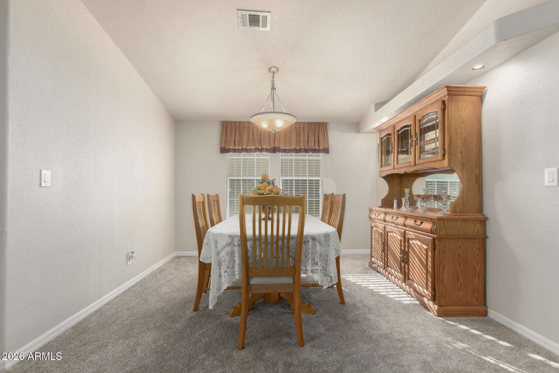 3301 South Goldfield Road, Unit 4086 Apache Junction, AZ 85119 - Photo 19 of 42 a view of a dining room with furniture