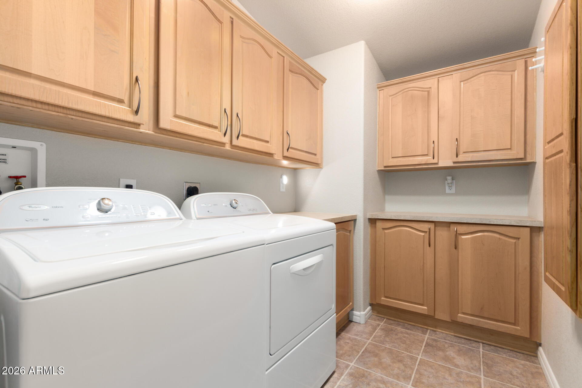3301 South Goldfield Road, Unit 4086 Apache Junction, AZ 85119 - Photo 36 of 42 a utility room with dryer and washer