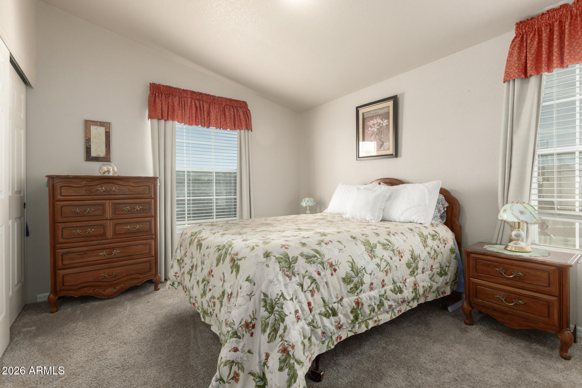 3301 South Goldfield Road, Unit 4086 Apache Junction, AZ 85119 - Photo 9 of 42 a bedroom with a bed and a window