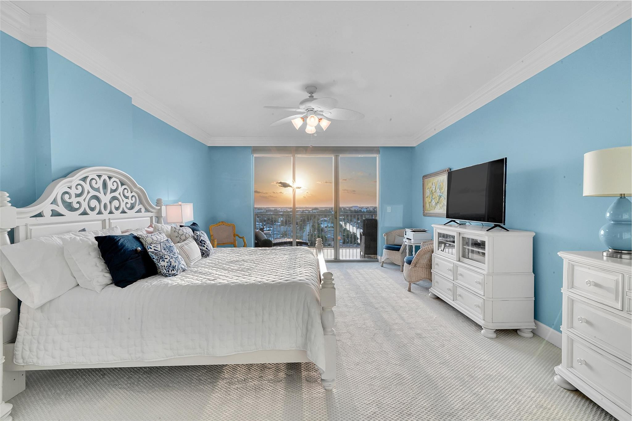 821 North Riverside Drive, Unit PH2 Pompano Beach, FL 33062 - Photo 5 of 95 a bedroom with a bed and a flat screen tv