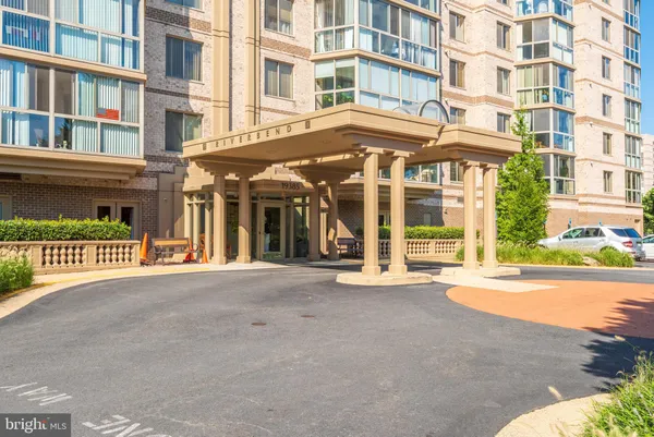 a view of a building with a street