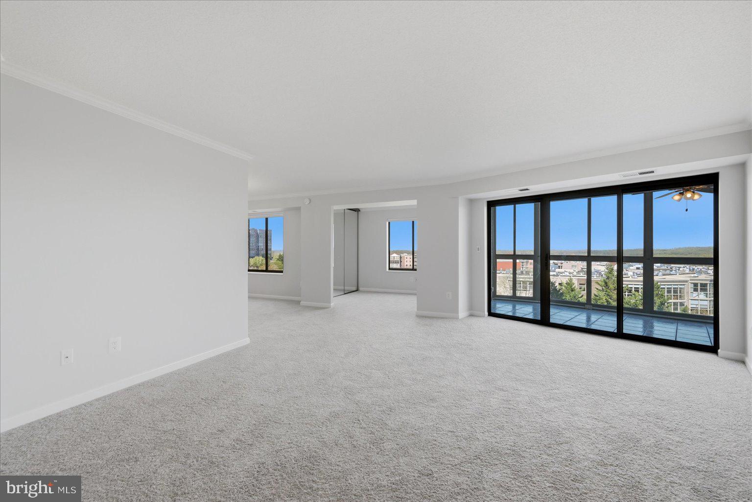 19385 Cypress Ridge Terrace, Unit 514 Leesburg, VA 20176 - Photo 16 of 81 Sliding Glass door to Sunroom with stunning views