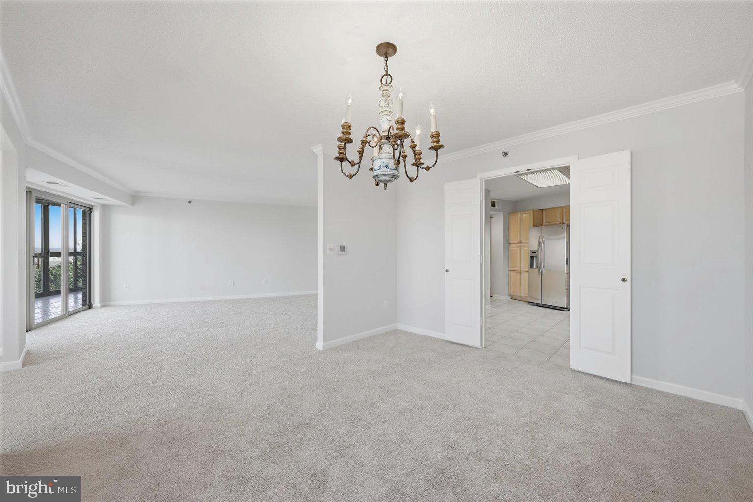 19385 Cypress Ridge Terrace, Unit 514 Leesburg, VA 20176 - Photo 29 of 81 Dining Room with french doors to kitchen