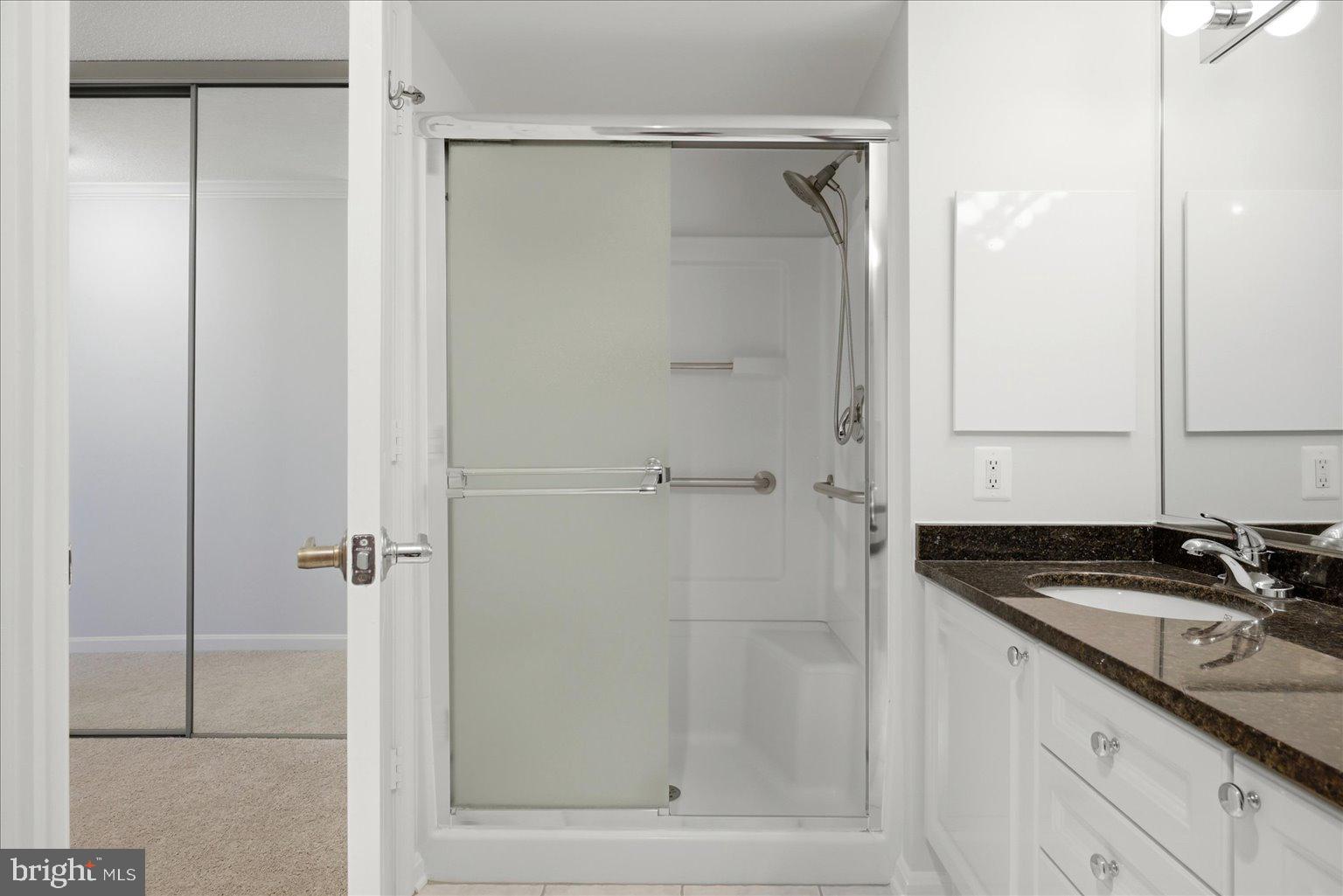 19385 Cypress Ridge Terrace, Unit 514 Leesburg, VA 20176 - Photo 41 of 81 Ceramic Tile flooring, tub and walk in shower