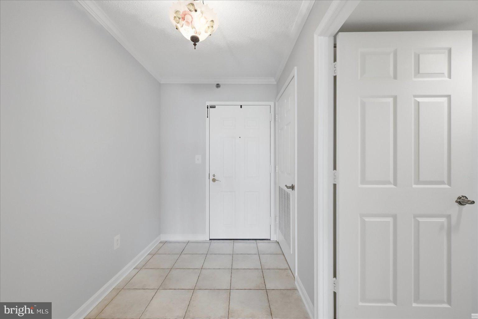 19385 Cypress Ridge Terrace, Unit 514 Leesburg, VA 20176 - Photo 7 of 81 Foyer with updated ceramic tile floor