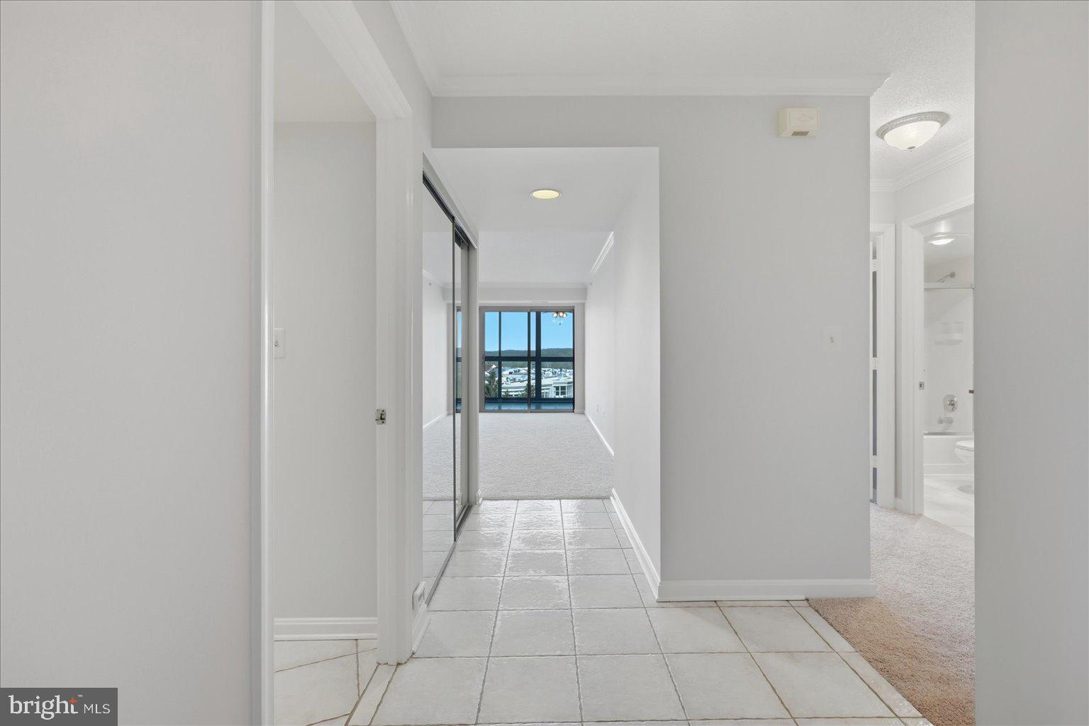 19385 Cypress Ridge Terrace, Unit 514 Leesburg, VA 20176 - Photo 8 of 81 Foyer view to Living room