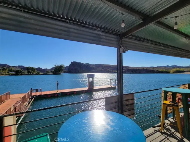 a view of a chairs and table in a room