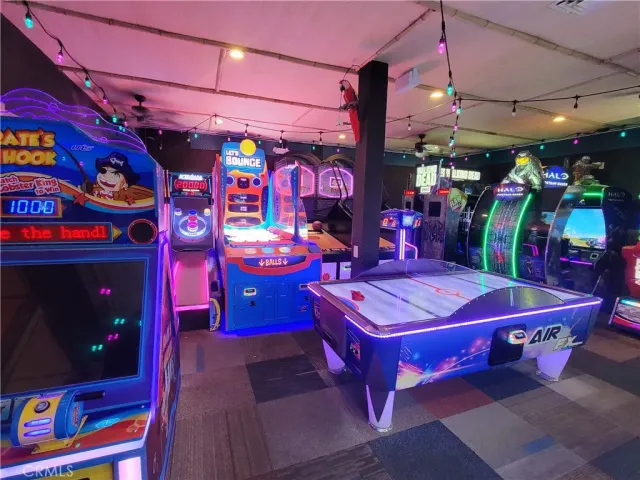 a room with gym equipment and stairs