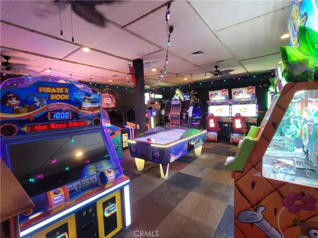 a room with lots of swings and furniture