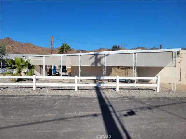 a view of a swimming pool and an outdoor space