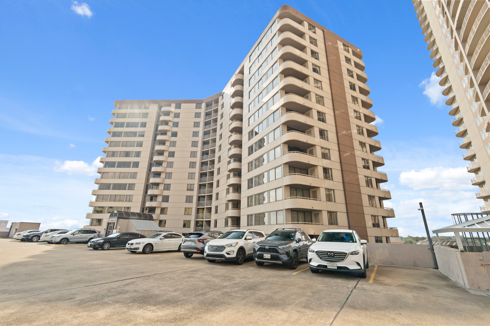 3525 Sage Road, Unit 1204 Houston, TX 77056 - Photo 2 of 25 Welcome to 3525 Sage Road #1204, a well-maintained condo located on the 12th floor of the 3525 Sage Condominium, featuring a well-kept building with convenient access and on-site parking.