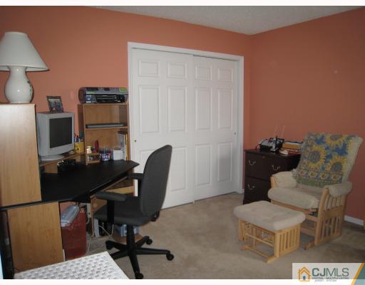 115 Inverness Drive Edison, NJ 08820 - Photo 8 of 10 a view of a workspace with furniture
