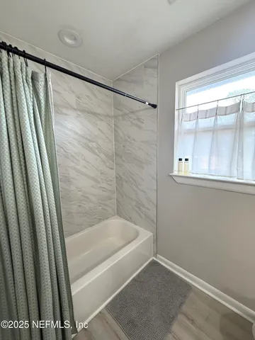 a bathroom with a bathtub