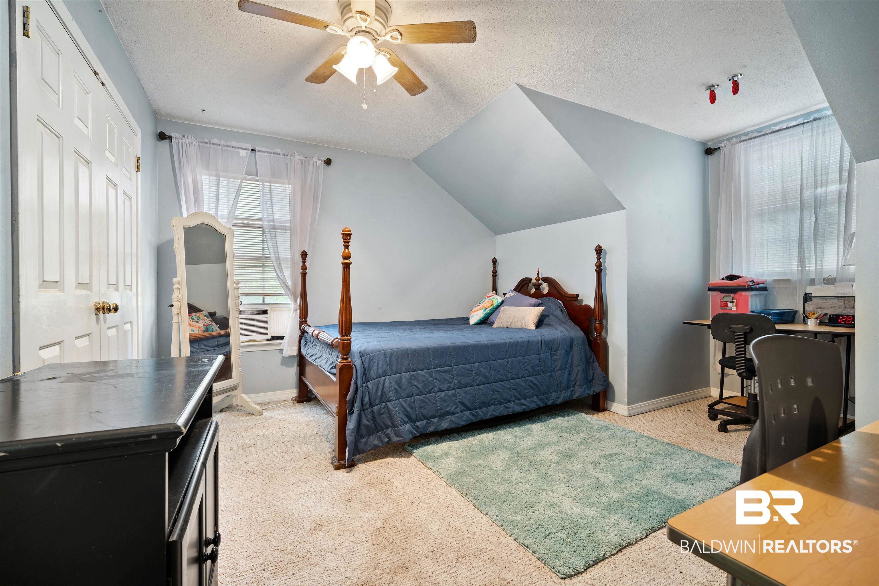 2823 Woodland Road Mobile, AL 36693 - Photo 19 of 29 Bedroom with ceiling fan, light carpet, lofted ceiling, and baseboards