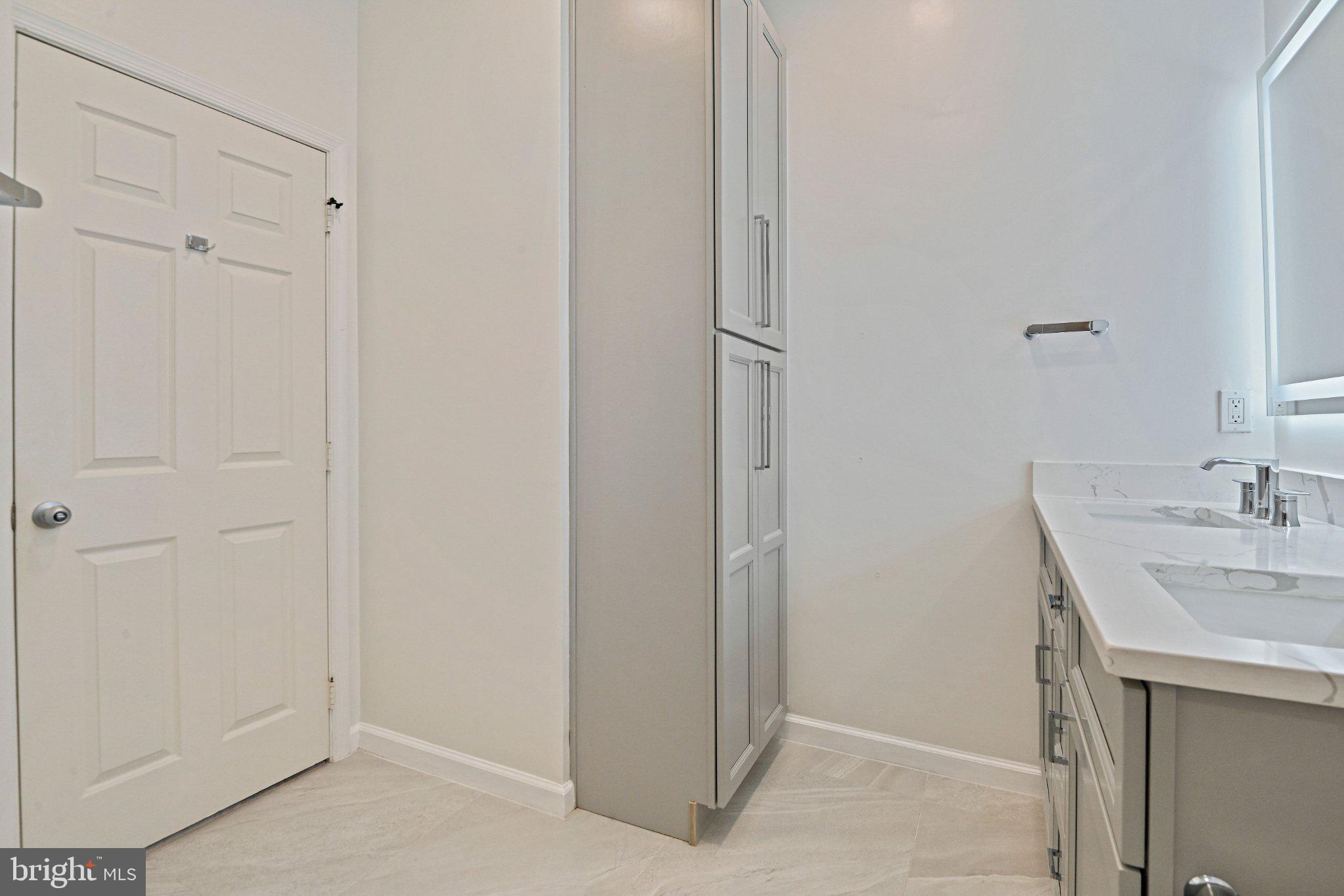 1519 North Point Drive, Unit 202 Reston, VA 20194 - Photo 35 of 49 Sleek and modern bathroom retreat.