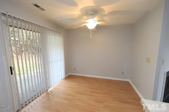 a view of a storage & utility room with dryer and washer