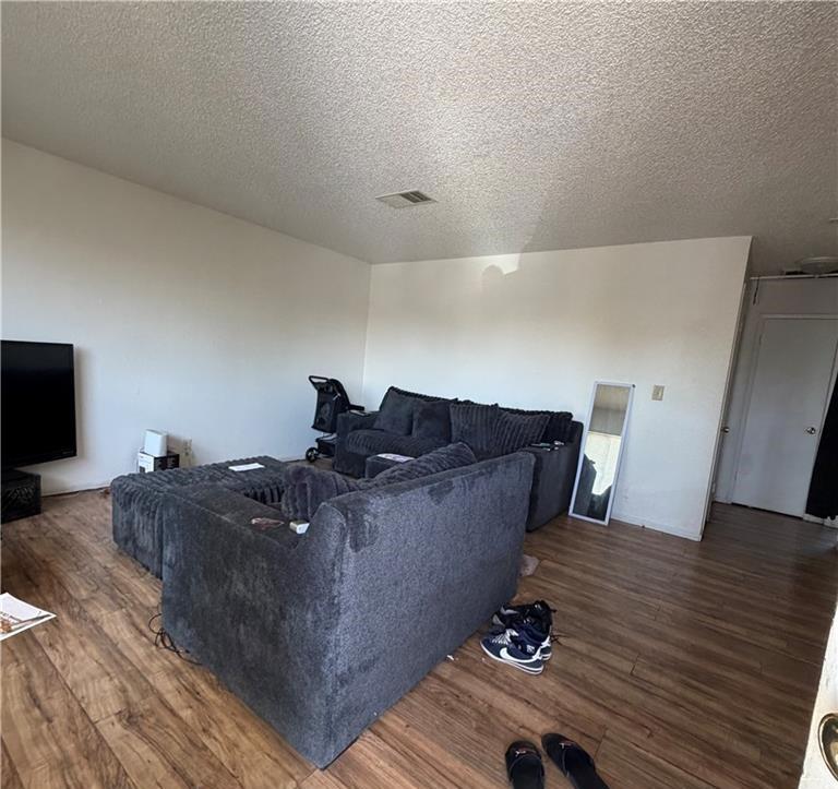 1567 Ellen Court Merced, CA 95341 - Photo 8 of 16 a living room with furniture and a flat screen tv
