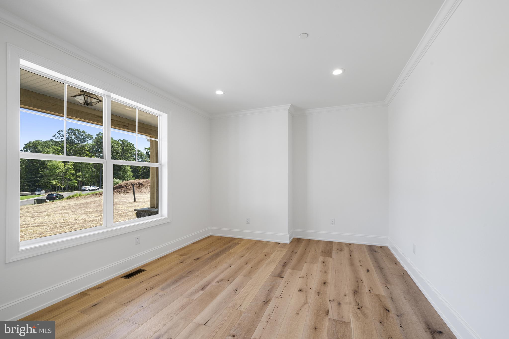 5 Big Oak Road Yardley, PA 19067 - Photo 13 of 27 a view of empty room with wooden floor and fan